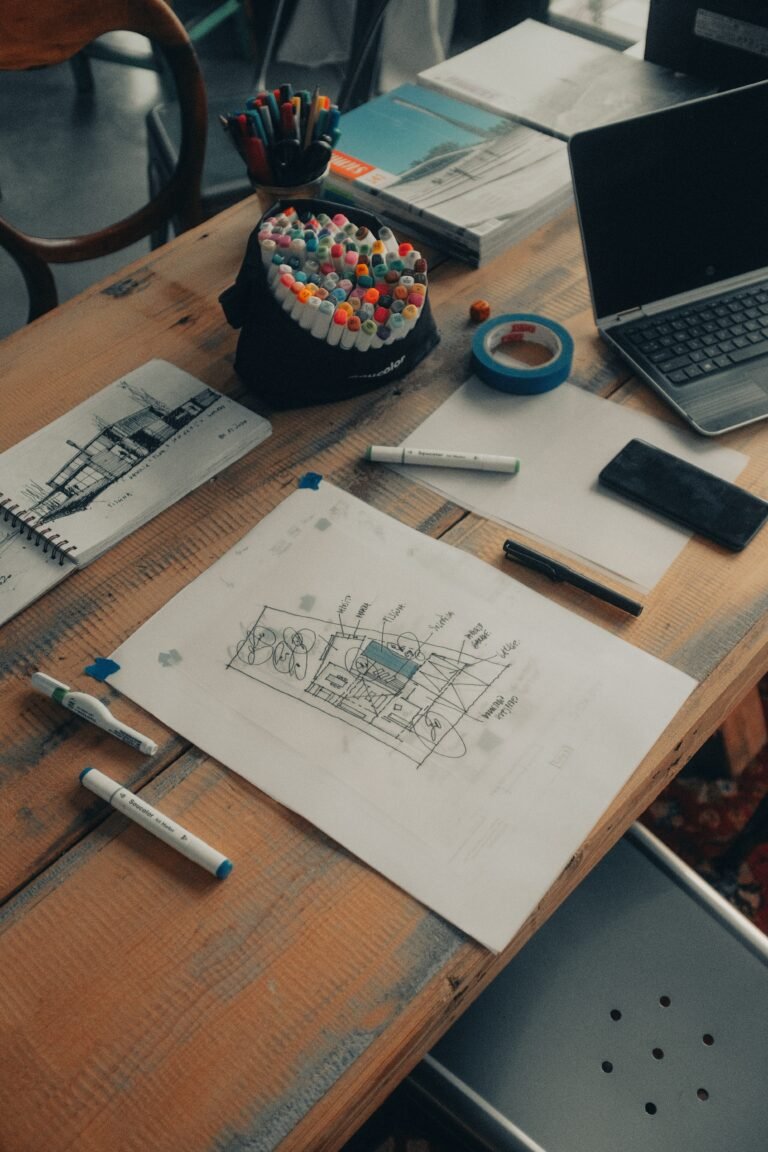 Architecture portfolio layout spread showing drawings and text on a page grid