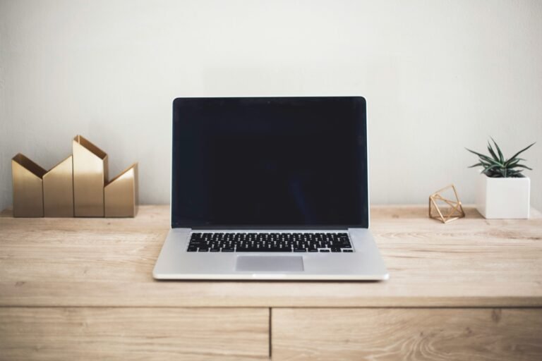 MacBook on a desk — can a MacBook run Revit for architecture school?